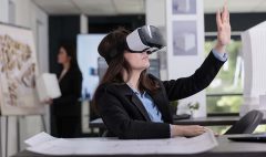 Architect in ar helmet touching virtual building model