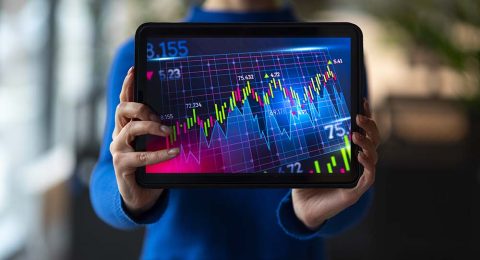 person-office-analyzing-checking-finance-graphs copy