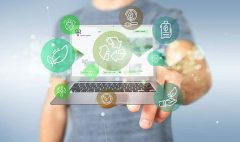 Businessman holding a Cloud of green ecology icon bubble with a laptop 3d rendering