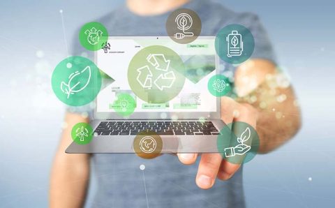 Businessman holding a Cloud of green ecology icon bubble with a laptop 3d rendering