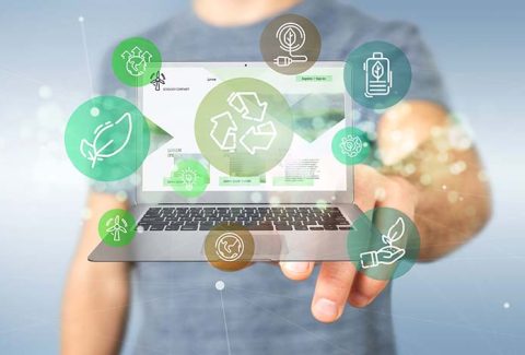 Businessman holding a Cloud of green ecology icon bubble with a laptop 3d rendering