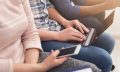 Group of unrecognizable people using gadgets
