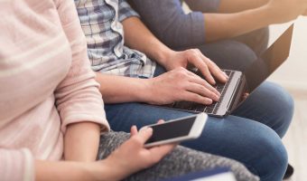 Group of unrecognizable people using gadgets